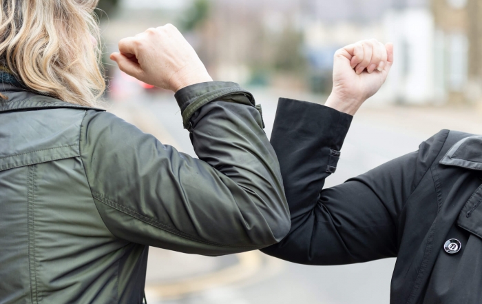 Elbow Bump between two people